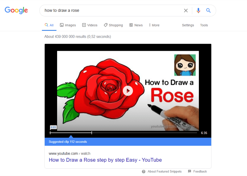 ejemplo del mejor video de youtube en los resultados de búsqueda de Google para 'cómo dibujar una rosa'