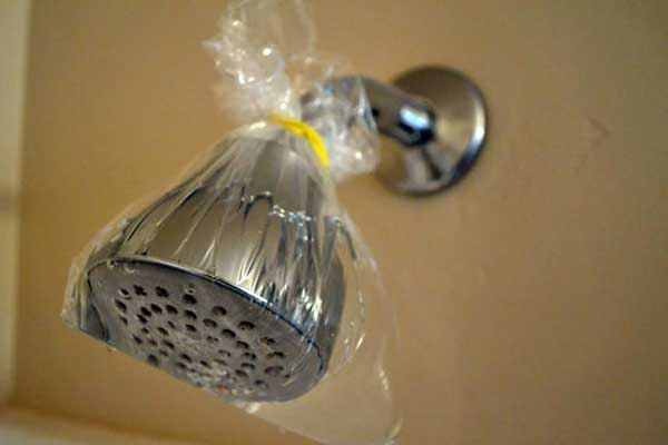 cómo limpiar el cabezal de la ducha