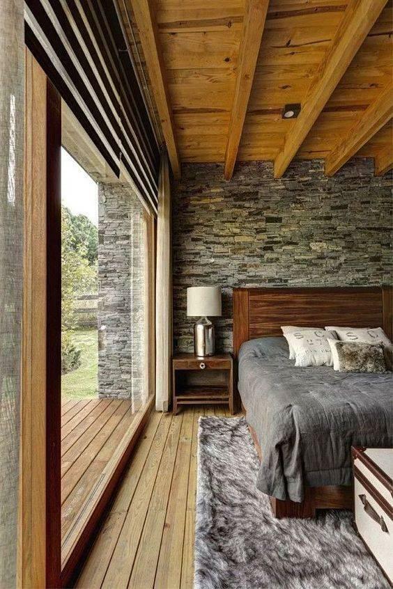 Decoración de paredes de piedra en dormitorios.