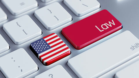 Imagen de teclado de la ley federal de Shutterstock 196543106